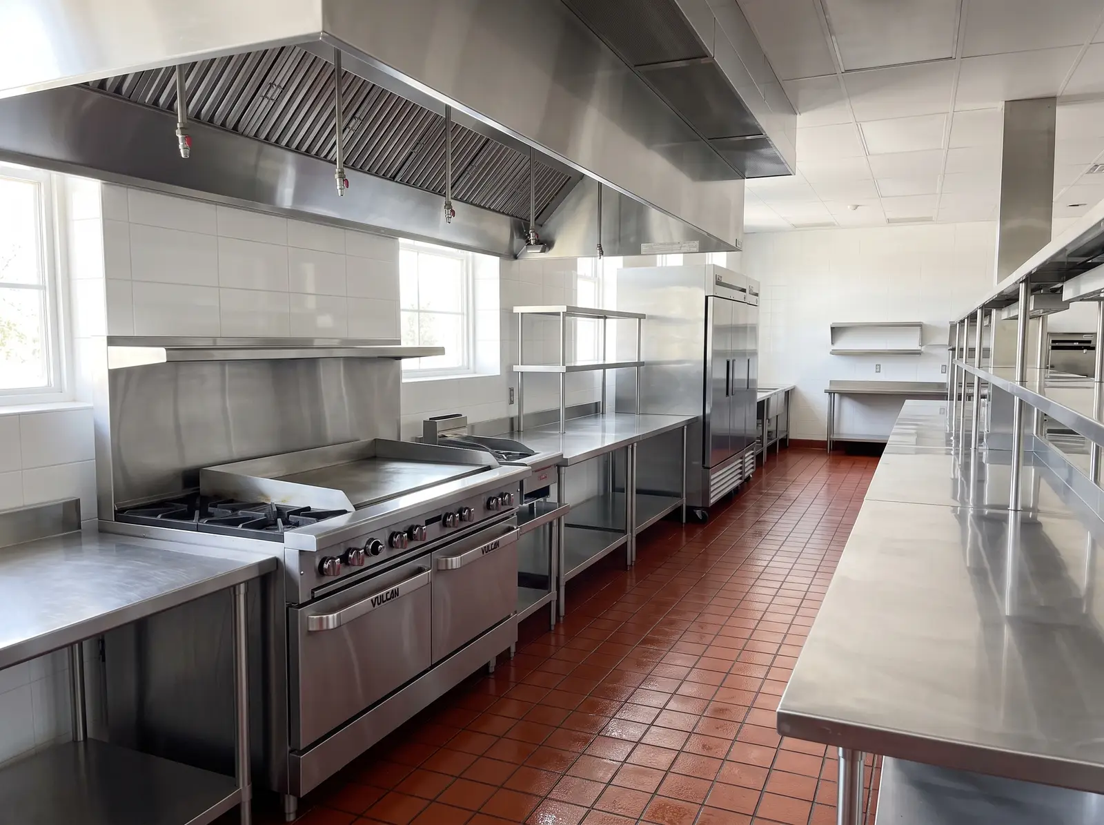 Empty commercial restaurant kitchen line after a deep clean